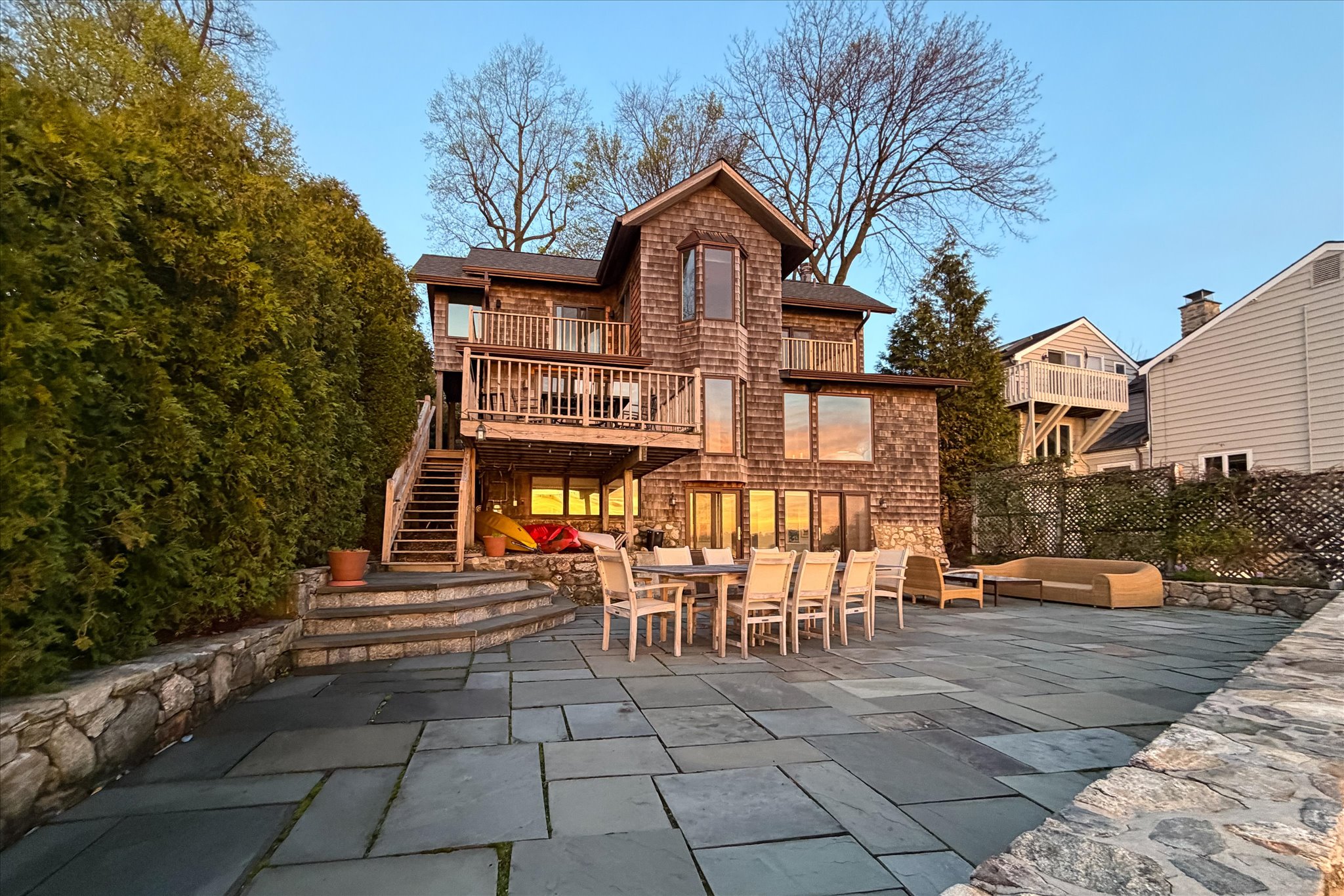 Luxury waterfront residence on Long Island Sound at golden hour